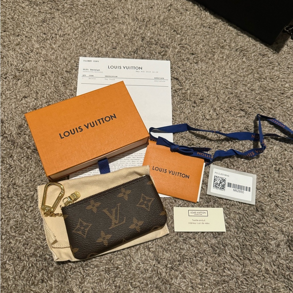 New in box Authentic Louis Vuitton Key Pouch Canvas Monogram